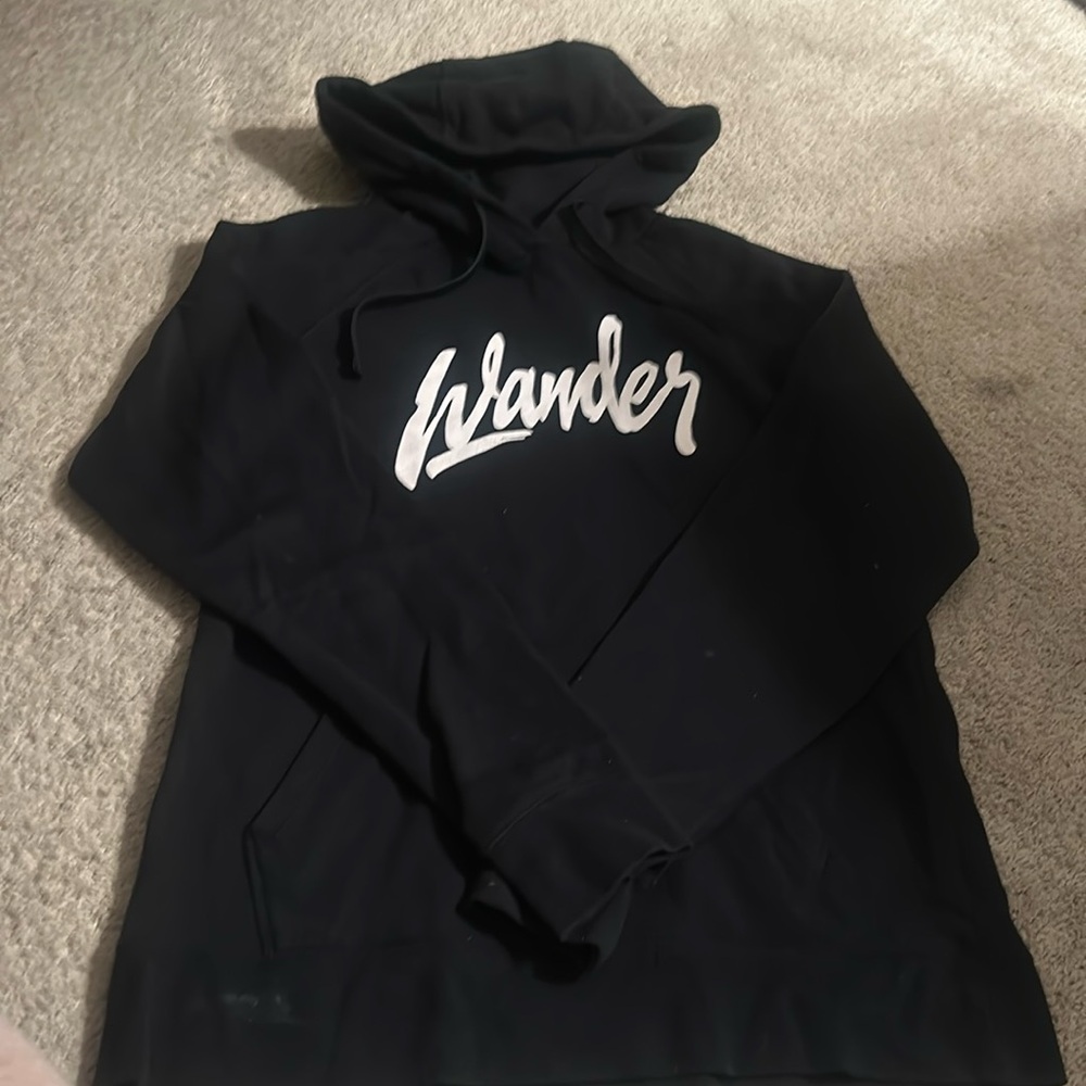 North face black hoodie that says wander